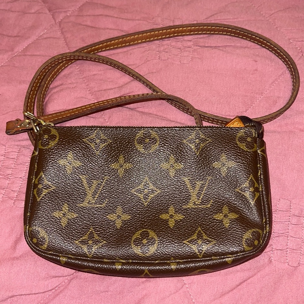 Authentic Louis Vuitton pouch with strap